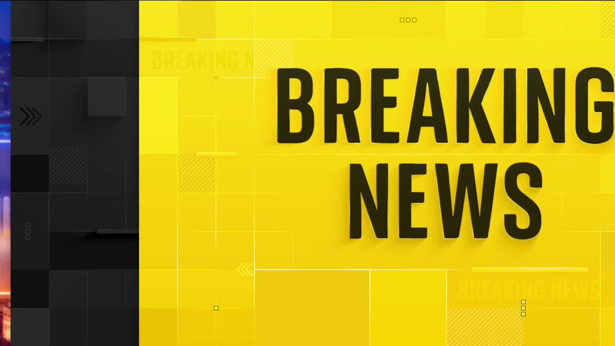 A bright yellow and black broadcast graphic with bold black text reading 'BREAKING NEWS' alongside geometric design elements.