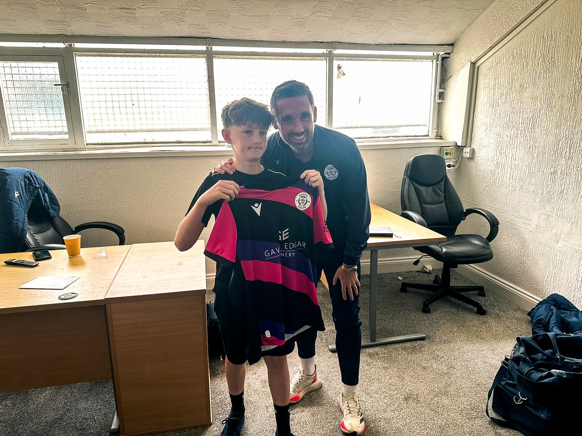 OfficialQosFC's tweet photo. A special moment for a young Doonhamer! 💙

We were delighted to welcome Rex Hitchell from Dalbeattie Primary School to Palmerston Park recently, following his winning design in our 2026/27 Third Kit competition! 👏

Rex had the chance to meet the first-team squad and see his winning design brought to life.

A fantastic achievement and a moment to remember for Rex! 👕