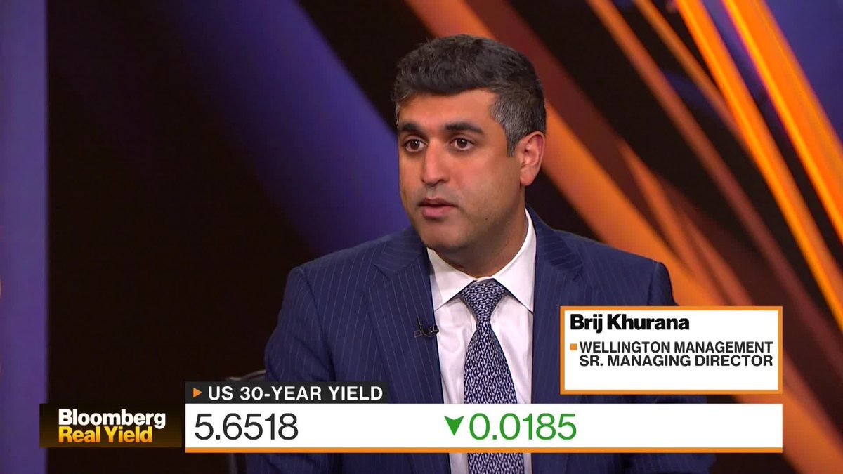 The image shows Bloomberg Real Yield host Brij Khurana, Senior Managing Director at Wellington Management, discussing the US midterm elections and their potential impact on the bond market. On-screen graphics highlight the US 30-year yield at 5.6518, down 0.0185.
