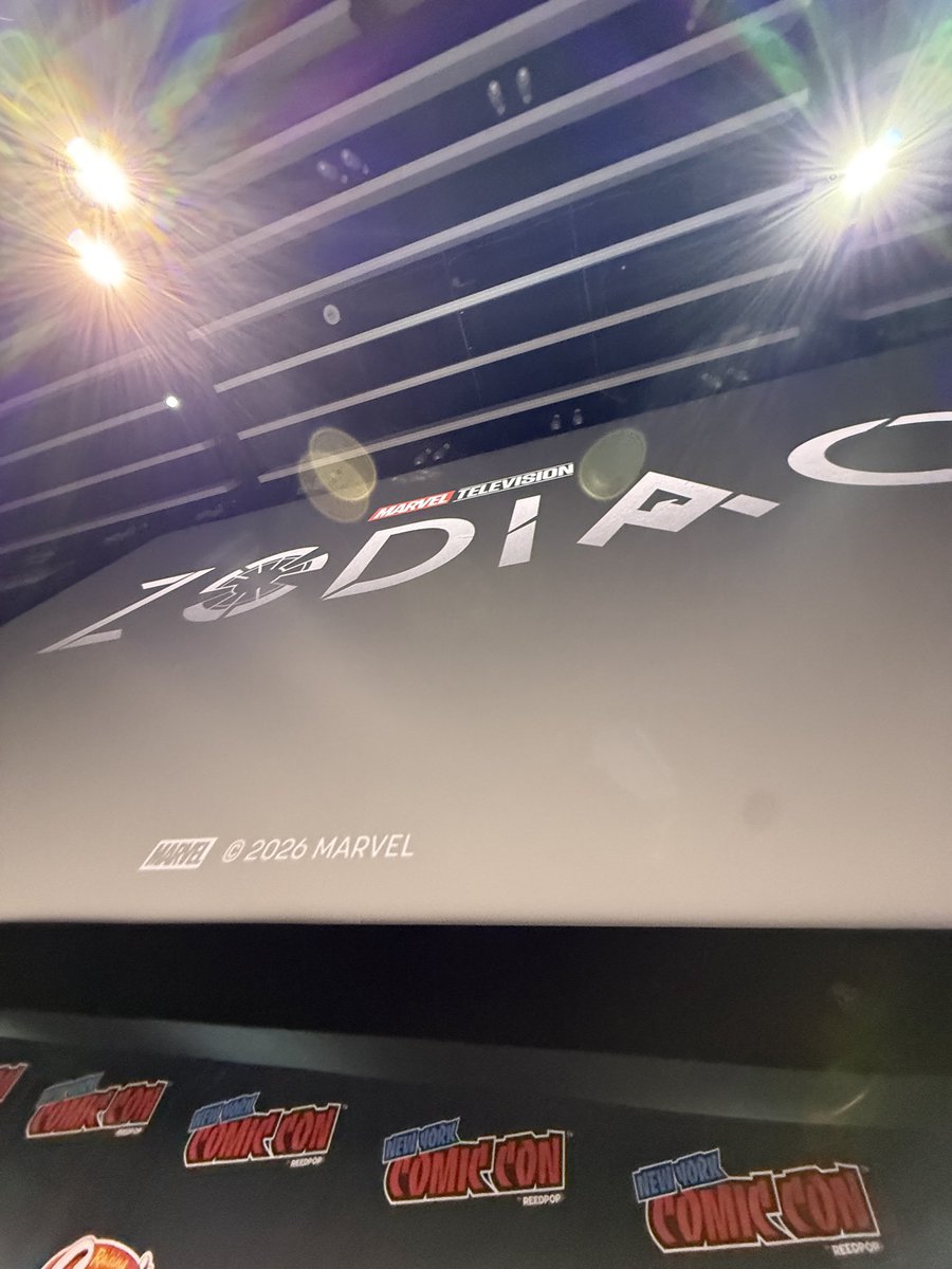 BrandonDavisBD's tweet photo. Marvel TV officially announces Zodiac. 

The logo on screen seems to allude to shield and a SHIELD logo in the font.

Production starts next year. Coming 2028. #NYCC https://t.co/XZd2SIzWWT
