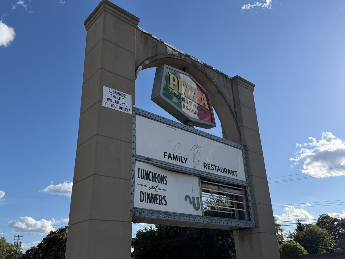 kirkpinhoCDB's tweet photo. The sign at the old Pasquale’s restaurant site on Woodward in Royal Oak getting mighty political https://t.co/yDF5XcgvIe