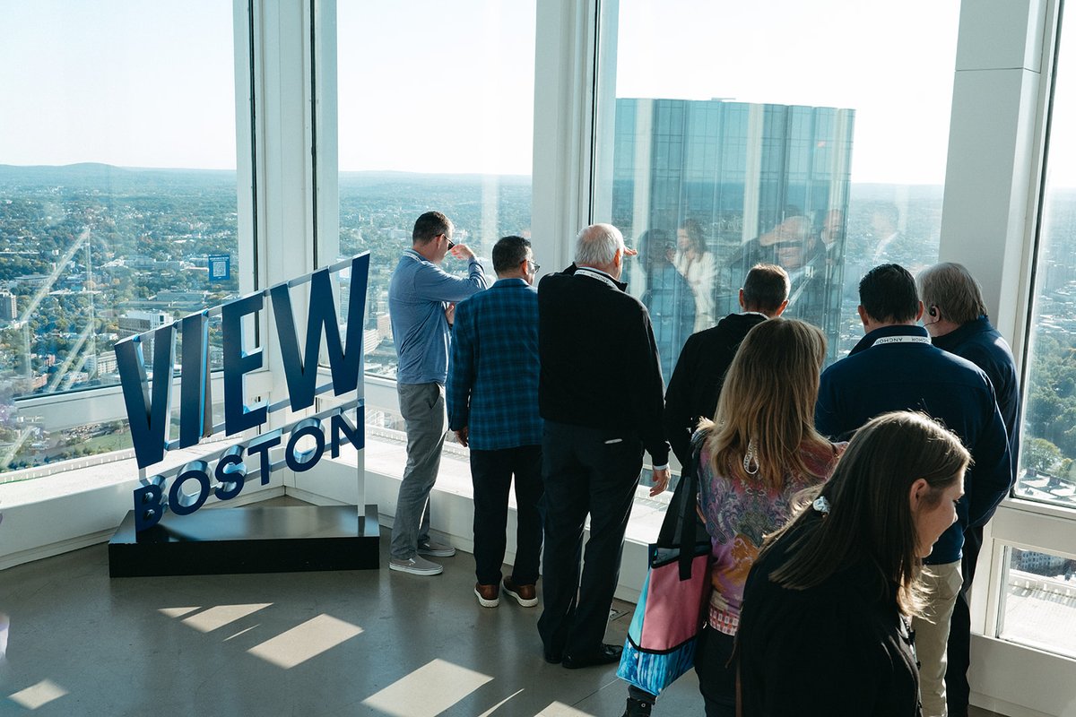 Colliers's tweet photo. The #ColliersHealthcare Fellows came together in Boston for an evening reception at View Boston after a full day of programming and discussion at the Pre-Conference. Thank you to Remedy for sponsoring the evening and helping make it a memorable start to #ColliersNHC2026. https://t.co/YVsLb6K5CW