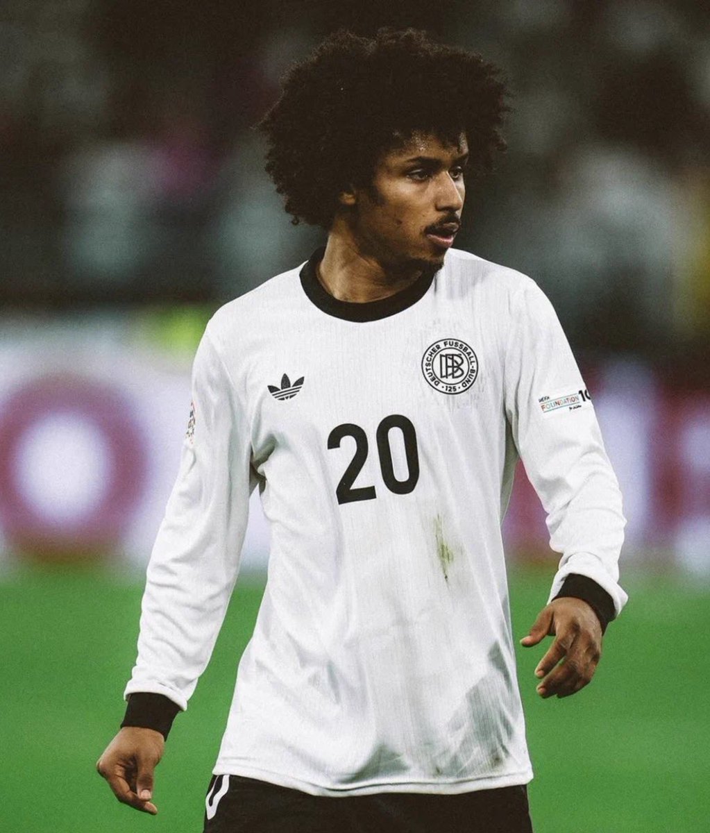 tomisinfcb's tweet photo. 🚨Jürgen Klopp on the unexpected changes in Karim Adeyemi’s game and the technical level he brought from Barcelona:

“When Karim came into the Germany camp, I thought I knew exactly what I was going to see.

Fast player.

Explosive player.

Very dangerous when there is space.

I was wrong.

I saw a different Karim.

And honestly, that surprised me.

The first thing I noticed wasn't his speed. It was his touch.

We were doing a small-sided game in training, and the space was tiny. Normally, this is where you immediately see who is comfortable technically because there is nowhere to hide.

Karim was taking the ball and getting out of pressure with one touch.

Sometimes two opponents would come toward him, and instead of fighting them with his physical qualities, he would simply move the ball into the space they had left.

I stopped watching the player and started watching the details.

That was when I thought, ‘Ah… Barcelona.’

You could see the technical education in him.

The body orientation.

The first touch.

The way he receives the ball already thinking about the next action.

Those things are difficult to fake.

And when you put him alongside the German players, you notice it even more.

I'm not saying the other players aren't technically excellent. They are.

But Karim had brought a particular level of technical confidence from Barcelona that stood out immediately.

He wasn't afraid to receive the ball in bad positions.

Actually, he seemed to enjoy it.

And I love players like that.

Give them the ball when everything is comfortable and everybody looks good.

Give them the ball when two players are coming to destroy the situation.

That's when you find out what a player really has.

Karim surprised me there.

And then, of course, you remember what he has physically.

That is the scary part.

Because the technical player is already difficult to defend.

The fast player is difficult to defend.

Now put both versions into one player.

What are you supposed to do?

I told him once, ‘Karim, you don't always have to prove that you are the fastest man on the pitch.’

He laughed.

I said, ‘I'm serious. Sometimes your first touch can beat the defender before your legs ever have to.’

That is the change I have seen.

He is not trying to win every situation with speed anymore.

Sometimes he wins it with his brain.

And that tells me he has grown.

People will always talk about his pace because it is obvious.

You see him run and everybody notices.

But as a coach, I am more interested in what happens before the run.

Why did he receive the ball there?

Why did he take that touch?

Why did he wait half a second?

Why did he suddenly accelerate?

Those little decisions tell you where a player is going.

And with Karim, I saw something I wasn't expecting.

The player who arrived from Barcelona had brought a technical level that, in certain moments, was simply the highest in our German group.

Not because he was trying to show everybody he was better.

He wasn't.

It was just natural.

He had learned to make difficult things look normal.

And that is what Barcelona can give a footballer when the environment is right.

So yes, I saw a different Karim.

But perhaps the funny thing is this:

Maybe he didn't become a different player.

Maybe we are simply seeing more of the player he was becoming all along.

And if he can combine that Barcelona technical education with the speed and explosiveness he already had...

Then Germany doesn't just have a fast winger.

We have a footballer who can make defenders ask the wrong question.

And when a defender starts asking the wrong question, Karim Adeyemi is already gone.”