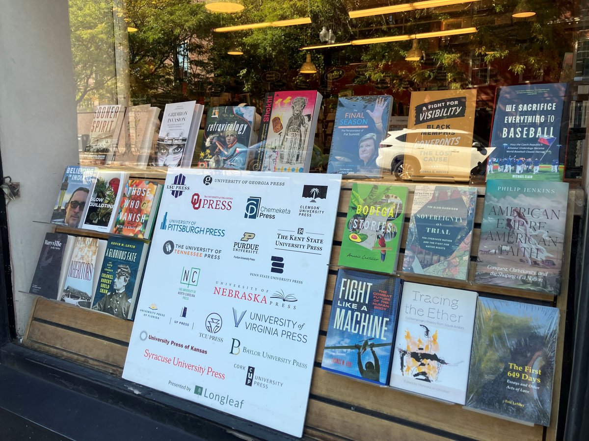 OUPress's tweet photo. We always love seeing our books on display! Many thanks to @HarvardBooks and @Longleafserv for sending us pictures of the latest window display. Featured Titles:  "Sooner Spirit" by Eddie Malone and "Fight Like a Machine" by @DrThomasMHunt. https://t.co/JCJ9N2lFwY