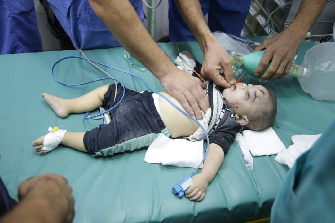 PalPress24's tweet photo. Today is not an ordinary day.

Today marks the anniversary of the loss of my son, Rakan.

My little boy, who came into this world after five years of waiting, lived for only nine months, and then was taken from us in a single moment under the bombardment.

On October 9, 2023, at around 2 a.m., I returned from my work as a journalist through the fire and destruction, only to find that my family was buried beneath the rubble… and Rakan was among them.

I cannot describe what it feels like for a father to search through the rubble for his child, or how a heart can accept that the little face that once filled our home with life will never come back.

Three years have passed… and I still find myself looking for him in the details of my life.

In my children’s laughter, in children’s toys, and every time I hold a child in my arms.

I once thought time would make the pain easier. Instead, it has only taught me how to carry it.

And today, as I hold Yaman in my arms, I feel that Rakan is still with me in another way.

Yaman is not a replacement for him, and he never could be.

Every child has a place in their father’s heart, and Rakan has a place that no one can ever take.

Rakan…

You were only nine months of my life, but you left behind a lifetime in my heart.

You left this world so young, but your memory grows with me every day.

May God have mercy on my son Rakan and make him among the birds of Paradise. May He reunite me with him one day, in a place with no bombardment, no fear, and no separation.

I miss you, Rakan… more than words could ever express.