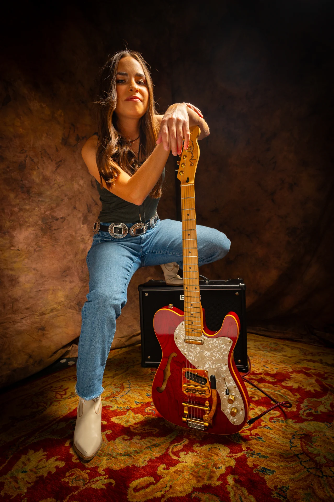 Marcy Grace posed with a guitar.
