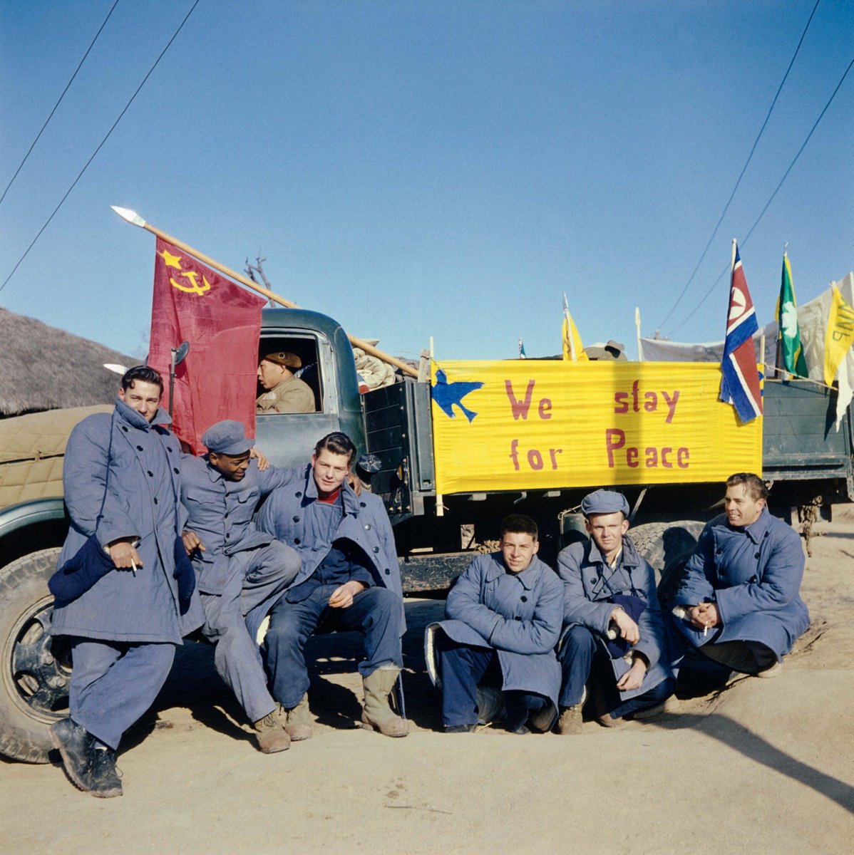 ForgottenWarPic's tweet photo. When the Korean War ended in 1953, thousands of prisoners were sent home.

But 21 American POWs said no.

They refused to come back to the United States. Instead, in early 1954, they crossed into China with their former captors. One British soldier went with them.

America was stunned. Newspapers called them turncoats. Congress and the Army demanded to know how American soldiers could be brainwashed into choosing communism. The word "brainwashing" became part of everyday American language largely because of the Korean War.

The truth was messier. Some had collaborated in the camps and were afraid of being court-martialed if they came home. Some had fallen for the propaganda. At least one, a Black soldier named Clarence Adams, said he was leaving behind a segregated country that didn't treat him as equal.

Life in China didn't turn out like they were promised. Most worked in factories or on farms. Within a few years, nearly all of them came back to the US, one by one.

Clarence Adams returned in 1966 and was hauled in front of Congress.

But one, James Veneris, never came back. He stayed in China for the rest of his life and died there in 2004, half a century after he crossed the border.