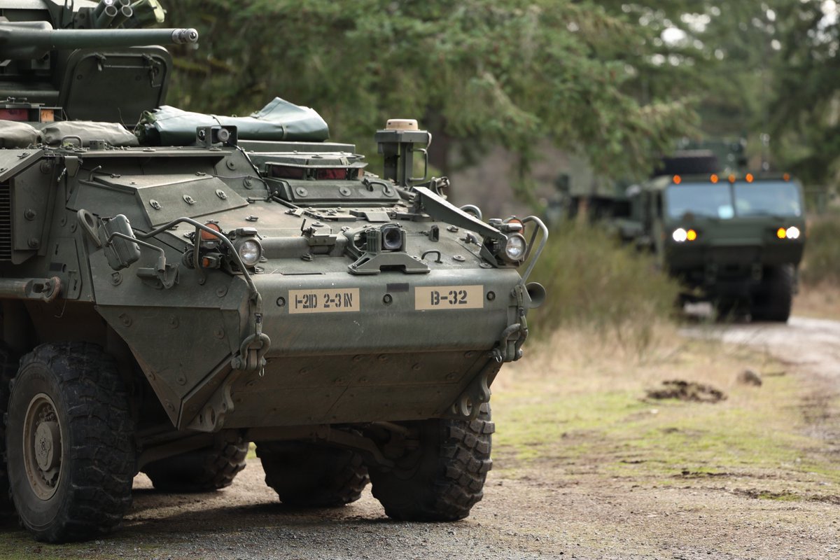 lfx160219's tweet photo. A Stryker M1304 ICVVA1-30mm assigned to 2nd Battalion, 3rd Infantry Regiment, 7th Infantry Division (Multi-Domain Command – Pacific) escorts a Dark Eagle Long-Range Hypersonic Weapon from 5th Battalion, 3rd Field Artillery Regiment (Long Range Fires Battalion), as part of Exercise Bamboo Eagle 26-1 at Joint Base Lewis-McChord, Wash., Feb. 18, 2026.source:https://t.co/giYQKkAycu