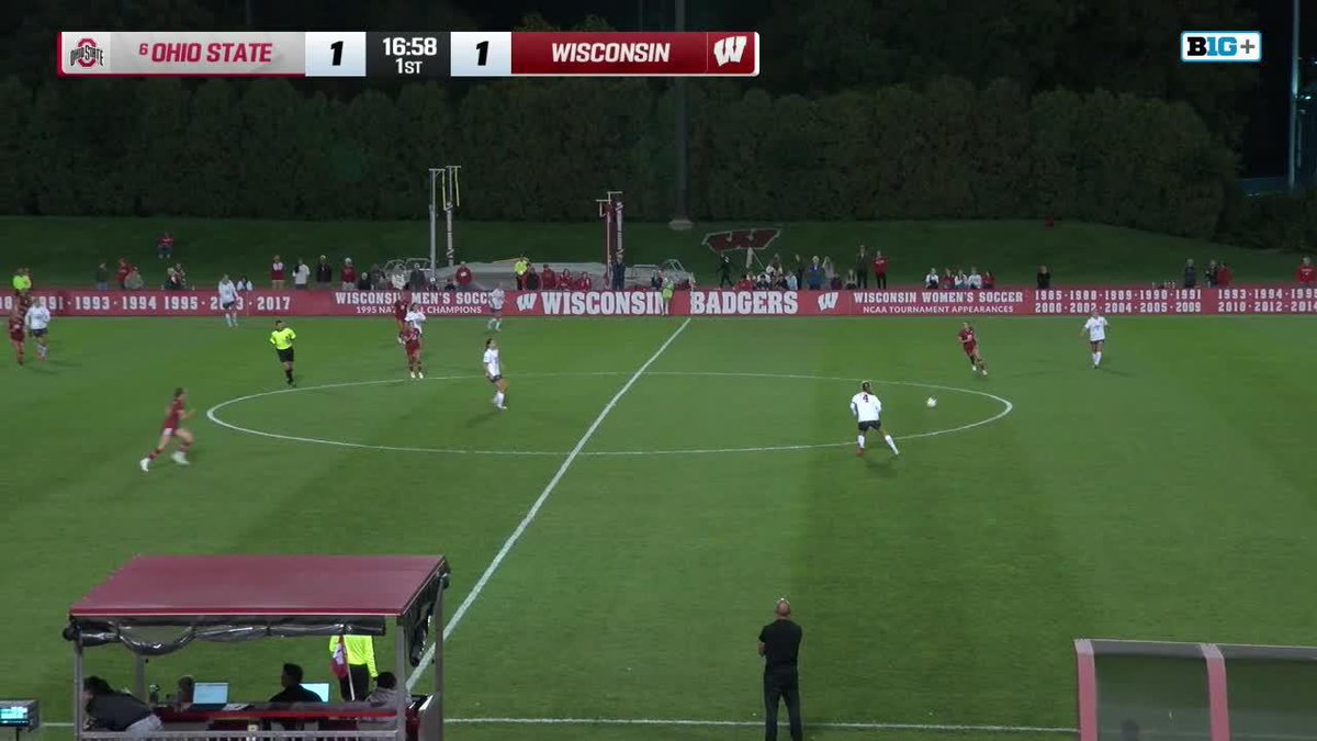 A soccer match between Ohio State and Wisconsin is tied 1-1 with 16:58 left in the 1st half, as Ohio State (in white) attacks down the right side while Wisconsin defends in their own half. The image appears to show the match in progress before the goal that would give Ohio State a 2-1 lead, with the Big Ten network broadcast showing the current 1-1 scoreline.