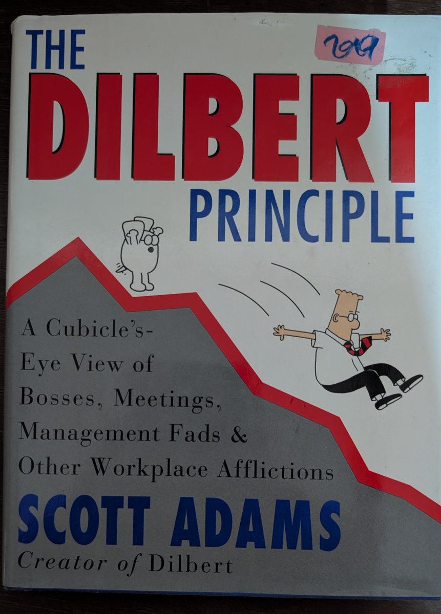 EUPThatsMe2's tweet photo. @ScottAdamsSays I found this signed first edition of the Dilbert Principle at a local store - the signature looks legit but the Dogbert looks a bit rough. Anyone know if it is an authentic Dogbert by Scott or did Dick add that later? https://t.co/vgs7iZNBPu