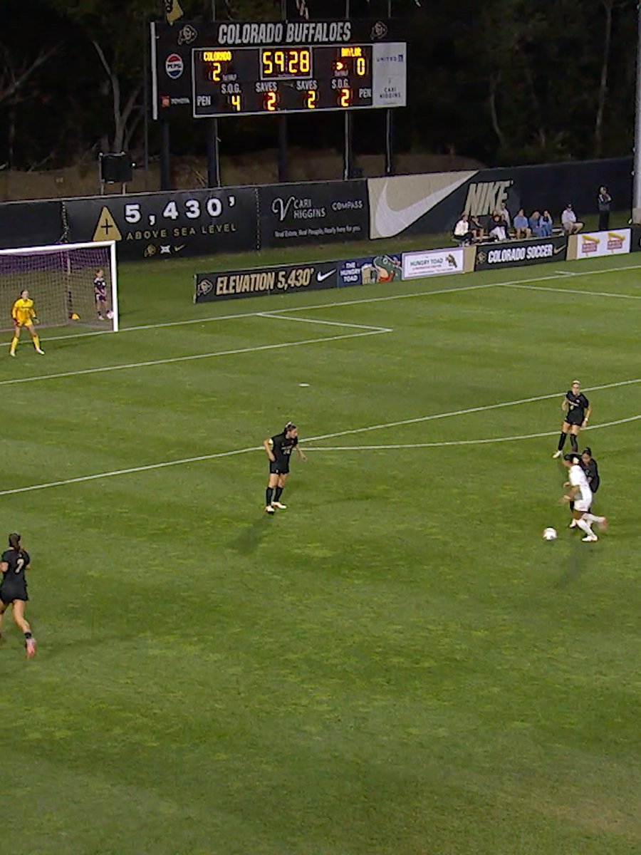 A women's soccer match takes place on a field at elevation 5,430', with a scoreboard showing the 'COLORADO BUFFALOES' leading 'WYO' 2-0 at the 59:28 mark.