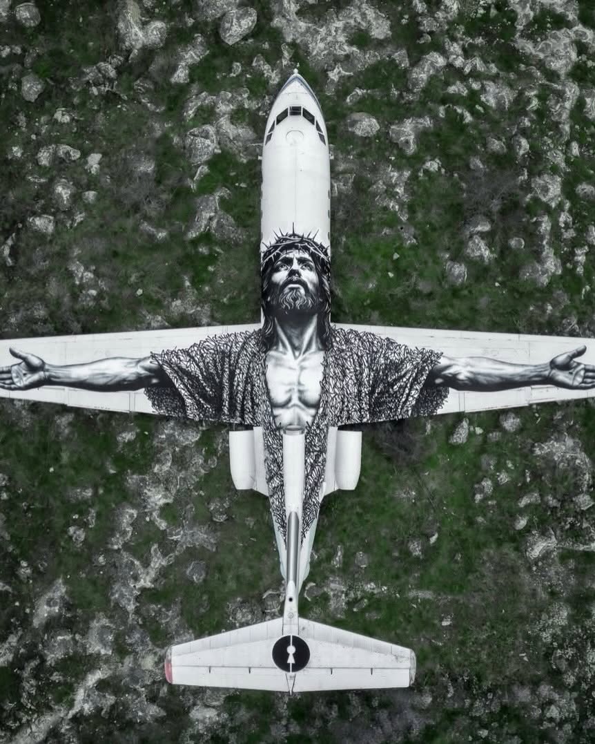 Complex's tweet photo. Absolute masterpiece 

Swiss artist @vierwind_ painted an abandoned plane in Armenia &amp; turned it into a massive mural of Jesus Christ.

[📷: via/ @mattia__coda ] https://t.co/8J8R9A3NdJ
