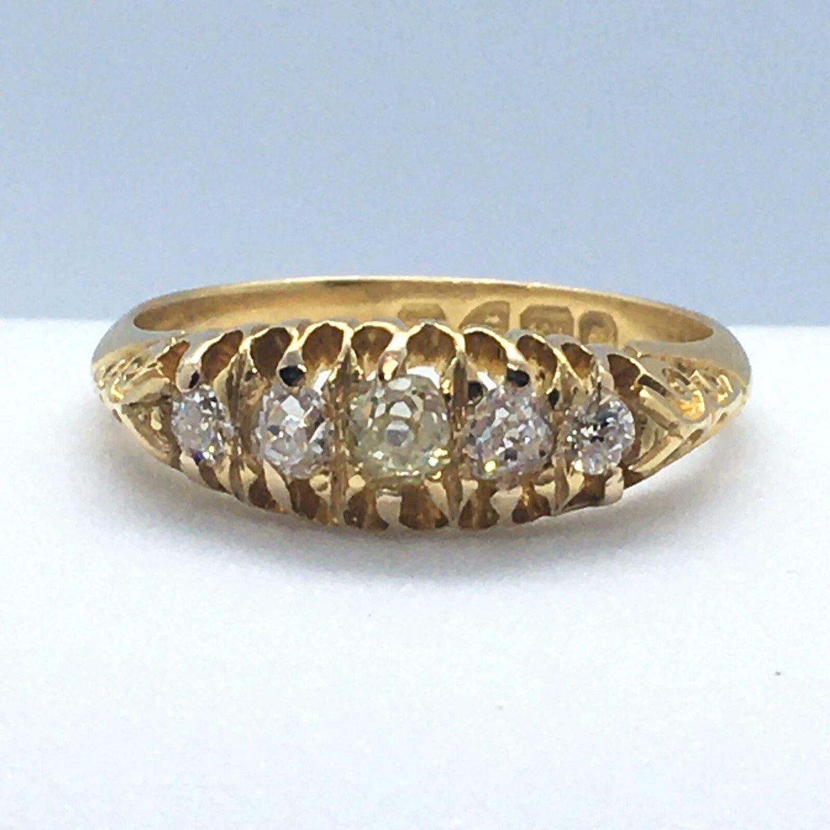 Nobel_Antiques's tweet photo. Chester Hallmarked 1901 
A beautiful English Victorian five-stone diamond ring crafted in 18K yellow gold with delicate hand-carved filigree detailing. Dated to 1901, the final year of the Victorian era. 
Notice hallmarks:  
1- Crown: Old British gold standard. 
2- "18" for 18K. 
3- Chester Assay Office Mark, the shield-shaped mark containing three wheat sheaves and a sword is the mark of the Chester Assay Office in England. Meaning it was tested and hallmarked in Chester, England, one of Britain's historic assay offices.
4- "A". This is the date letter used by the Chester Assay Office. For the style shown in this particular hallmark set, the letter A corresponds to 1901. Final year of Queen Victoria's reign.
#VictorianRing #AntiqueDiamondRing #Chester1901 #EstateJewelry #AntiqueJewelry #FineJewelry #OldEuro
https://t.co/9x0QJxQhMz