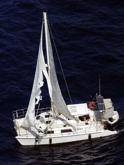 maniaUFO's tweet photo. The eerie discovery of the Kaz II in April 2007 remains one of Australia's most infamous modern maritime mysteries. Dubbed the "Modern Mary Celeste," the 9.8-meter catamaran was found drifting with its crew missing under puzzlingly normal conditions: a laptop was still powered on, food and cutlery were set out on the table, and the men's wallets and personal belongings were completely untouched.

What Rescuers Found On Board

The state of the Kaz II suggested the crew had vanished in an instant. The investigation revealed the following specific attributes: 

The Engines & Systems: The diesel engine was still running in neutral. The GPS, radio, and navigation computers were fully functional and active. 

The Sails: The boat's sails were up, though the headsail was found badly shredded. 

Safety Equipment: All three life jackets, the emergency beacon (EPIRB), and the life raft were completely untouched and remained on board. 

Deck Conditions: The men's clothing and towels were found in neat piles on the rear deck, and the boat's fenders were out.
