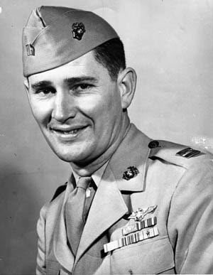 WWIIMemorial's tweet photo. Joseph Jacob Foss of Sioux Falls, South Dakota, a Major in the U.S. Marine Corps, was awarded the Medal of Honor for his extraordinary actions on October 9, 1942, over Guadalcanal.

Foss was a private in the 147th Field Artillery Regiment, Sioux Falls, South Dakota National Guard, from 1939 to 1940. By 1940, Foss enlisted in the Marine Corps Reserves to join the Naval Aviation Cadet program. After being designated a Naval Aviator, he was commissioned as a second lieutenant. On October 9, 1942, Foss and his group were launched off the USS Copahee escort carrier and flew 350 miles to reach Guadalcanal. Foss soon gained a reputation for aggressive fighter tactics and uncanny gunnery skills. He shot down a Japanese plane on his first combat mission, and in the several months of sustained combat, Foss had shot down a total of 26 enemy aircraft. Having matched the record of 26 kills held by America’s top World War I ace, Eddie Rickenbacker, Foss was accorded the honor of becoming America’s first “ace-of-aces” in World War II.

During the Korean War, Foss, then a Colonel, was called to active duty with the United States Air Force, relinquishing command of the 175th Squadron, and served as a Director of Operations and Training for the Central Air Defense Command; he eventually reached the rank of Brigadier General.

In 1955, Foss became the youngest governor of South Dakota at age 39.  In 1959, he became the first Commissioner of the American Football League. He stepped aside as commissioner in April 1966, two months before the historic agreement that led to the merger of the AFL and NFL and the creation of the Super Bowl. He was also inducted into the National Aviation Hall of Fame in 1984. In 1988, Foss was elected to two consecutive one-year terms as president of the National Rifle Association of America. Foss suffered a stroke in October 2002 and died three months later on New Year’s Day, 2003. He is buried in Arlington National Cemetery, Arlington, Virginia.

#WeRememberThem