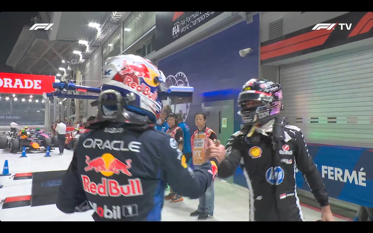 leclercsletters's tweet photo. charles congratulating max (HIS HELMET LOOKS SO PRETTY AT NIGHT) https://t.co/4qZ7473ygI