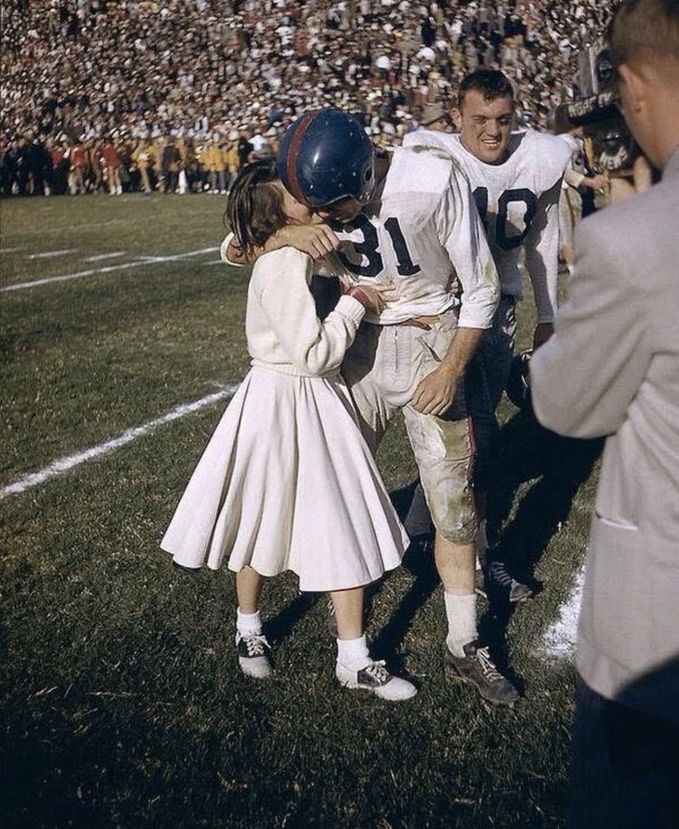 collegefbhist's tweet photo. A victorious Ole Miss football player being kissed by a cheerleader after the Cotton Bowl 1956. https://t.co/HxeBfx4Z96