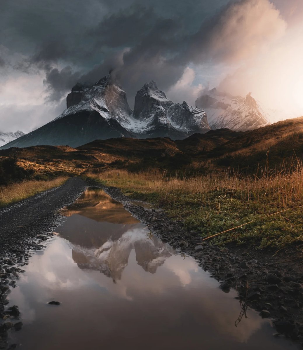 Emosgny's tweet photo. Los Cuernos drew us to Torres del Paine, but they remained elusive behind the clouds. When they finally emerged, especially at sunrise, they revealed pure magic. https://t.co/8i25nIziXP