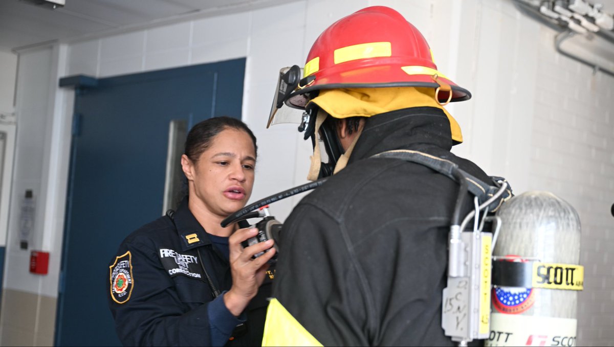 CorrectionNYC's tweet photo. In recognition of #NationalFirePreventionWeek, a thank you for your service goes to the heroes working in the #NYCDOC Fire Safety Unit. 
 
Led by Captain Bello, a 12-year veteran, this specialized team of correctional professionals helps to protect life and property on #RikersIsland 24/7/365. Their work includes response to all fire/smoke alarms, fire inspections, fire drills and staff training. 
 
Our Fire Safety Unit members also bring a wealth of skills to our agency, with many having fire safety experience in the military and internationally.
 
Check out scenes of members of this unit training our Recruit Officers in the Correction Academy earlier this week. The exercises included instruction in fire extinguishment, hose line control, Self-Contained Breathing Apparatus (SCBA) inspection and search and rescue tactics. 

This career path is one of many advancement opportunities for New York City Correction Officers. Get your foot in the door to a rewarding career in #NYC public safety today by registering for @NYCDCAS Correction Officer Exam #7302 at https://t.co/9JTq8tr7Yi. 

View more pics from the training at https://t.co/17pHxaMblY. 

#HispanicHeritageMonth #JoinTheBoldest #NYCDOCHeroes