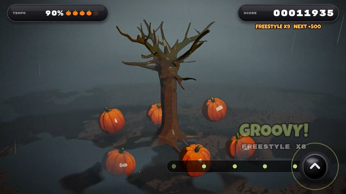 Screenshot from a rhythm or game application showing a spooky tree surrounded by pumpkins in a foggy landscape, with a score of 00011935, "FREESTYLE X9 NEXT +500" text, a 90% tempo indicator, and a "GROOVY!" message with "FREESTYLE X8" displayed.
