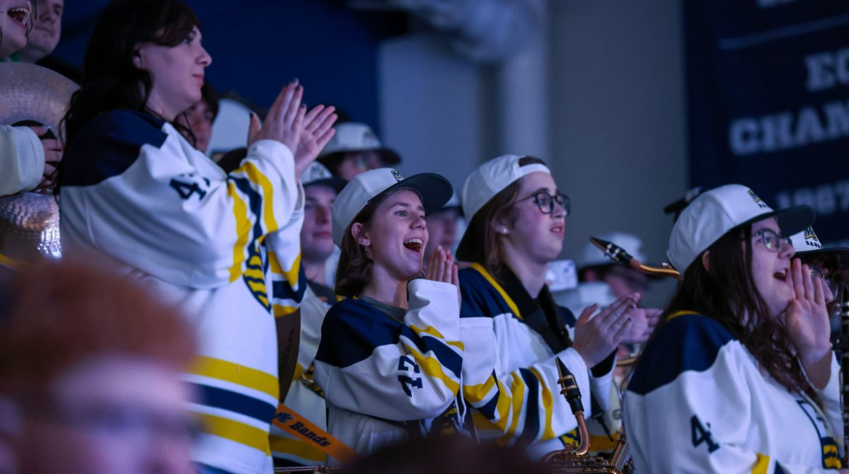 Merrimack's tweet photo. A moment in MC history. The Hockey East Championship banner has officially been unveiled! https://t.co/QrAWiMO8aJ