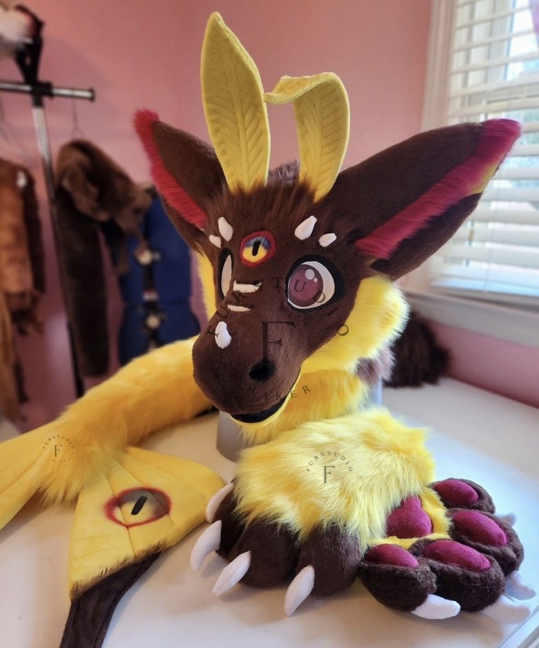 Furstudioo6's tweet photo. Custom-made fursuit reveal for 2026! 

Another moth-themed dutchie, inspired by the beautiful comet moth! I absolutely LOVE how this one turned out. So many details and so much care went into bringing this character to life!

Some of the features include airbrushed details, a moving jaw, an adjustable head strap, a hidden head zipper, fully lined paws, and more! 

Every detail was crafted with care to bring this unique character to life. 

#FursuitMaker #FurryFandom #Fursona #FursuitPartial #MothFursuit #DutchieFursuit #CustomFursuit #FursuitCommission #Furry