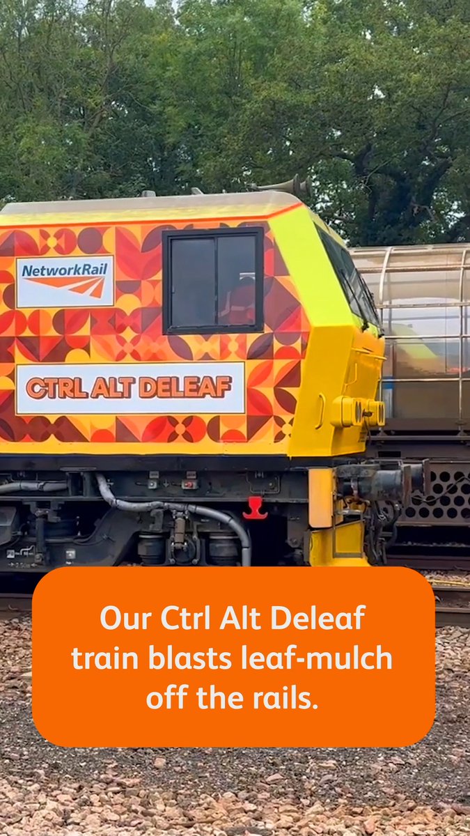 A Network Rail train engine painted in a vibrant orange and yellow pattern with the text 'CTRL ALT DELEAF', accompanied by an orange text box stating 'Our Ctrl Alt Deleaf train blasts leaf-mulch off the rails.'