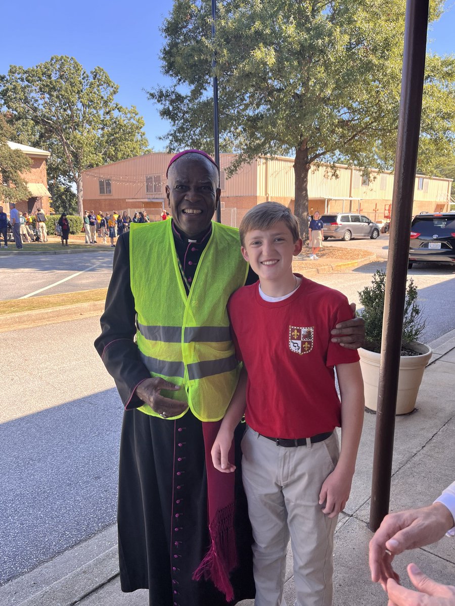 DioceseChas's tweet photo. On Oct. 7 Bishop Fabre made a surprise visit to Our Lady of the Rosary school while he was in Greenville. Bishop gave students a special blessing and helped teachers with afternoon dismissal. It was a lovely time on campus!

#ourladyoftherosary #catholicschool #bishop #greenville https://t.co/v70GVLgPby