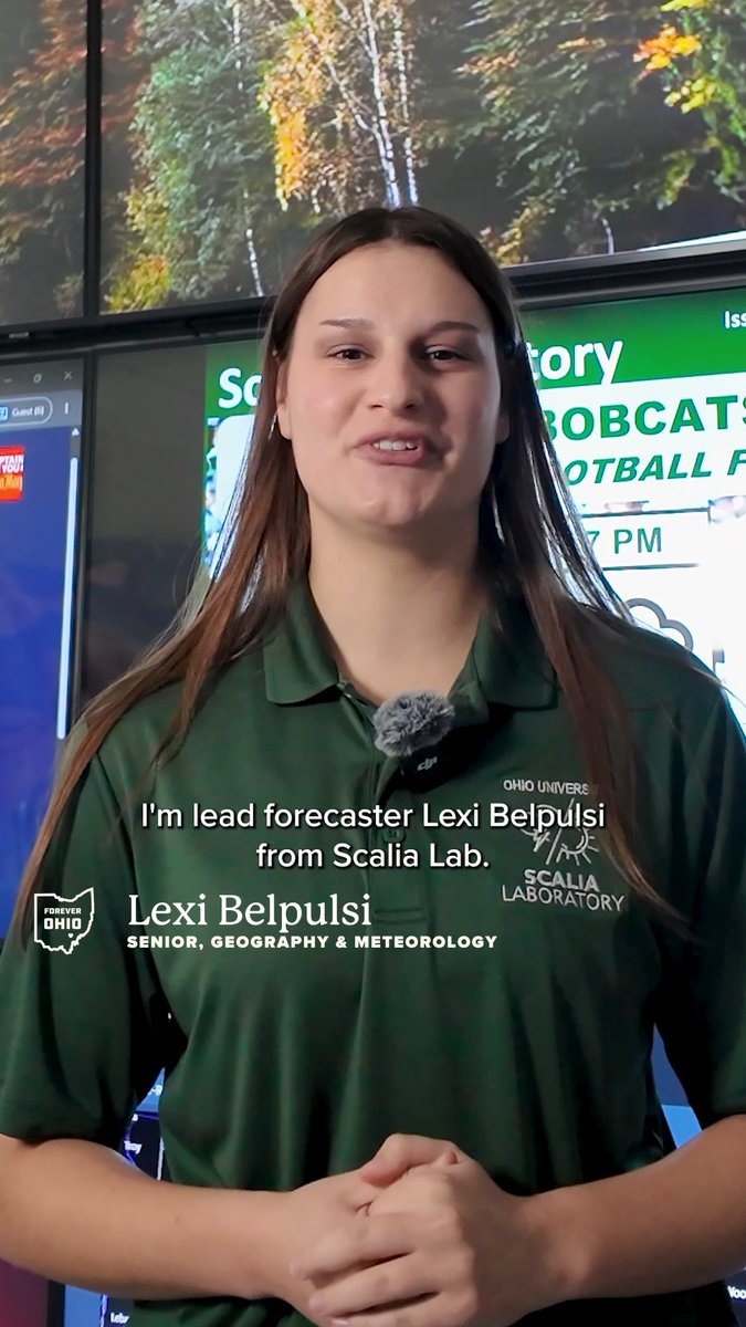 A young woman named Lexi Belpulsi, identified as 'Senior, Geography & Meteorology,' speaks to the camera while wearing a green 'Ohio University Scalia Laboratory' polo, with a weather broadcast graphic visible behind her.