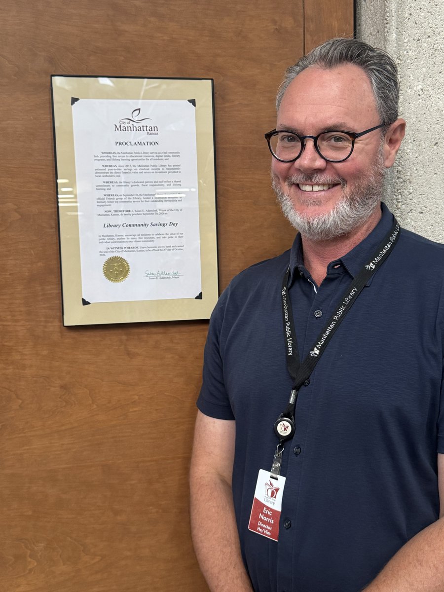 ManhattanPL's tweet photo. A wonderful conclusion to our #ShowUrReceipts campaign: Mayor Adamchak declared Sept 30, 2026 as Library Community Savings Day in Manhattan! Library Director Eric Norris displaying the official proclamation. https://t.co/ERUjNC0SWe https://t.co/wzWkOnRtZL
