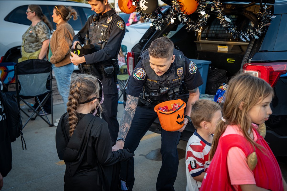 FargoPolice's tweet photo. Spooky season is officially underway! 👻🎃

On Wednesday, October 7, our #FargoPD officers kicked off attending their first of several Trunk or Treat events this month at @bethelfargo, and the costumes did not disappoint! We spotted fellow officers, members of the SWAT team, skeletons, K-Pop Demon Hunters, soccer players and plenty of other creative costumes. Between the candy, high fives and Halloween spirit, it was a great evening!

Today, on Faith & Blue Day, we're celebrating the connections between law enforcement and the faith community. Attending events like this are a great reminder that building relationships doesn't always have to be complicated. Sometimes, it starts with handing out candy and getting to know one another.

Thank you to Bethel Church for having us! We're looking forward to more Halloween fun throughout October. 🍬