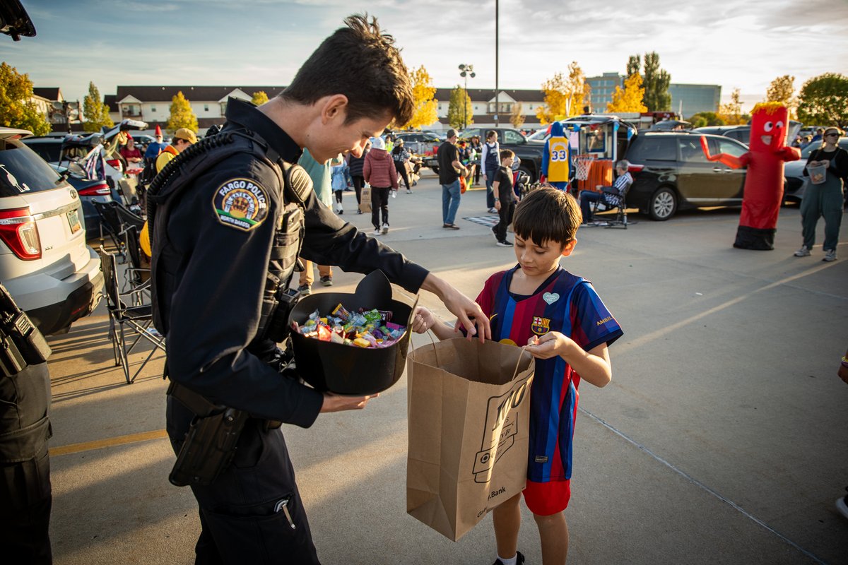 FargoPolice's tweet photo. Spooky season is officially underway! 👻🎃

On Wednesday, October 7, our #FargoPD officers kicked off attending their first of several Trunk or Treat events this month at @bethelfargo, and the costumes did not disappoint! We spotted fellow officers, members of the SWAT team, skeletons, K-Pop Demon Hunters, soccer players and plenty of other creative costumes. Between the candy, high fives and Halloween spirit, it was a great evening!

Today, on Faith & Blue Day, we're celebrating the connections between law enforcement and the faith community. Attending events like this are a great reminder that building relationships doesn't always have to be complicated. Sometimes, it starts with handing out candy and getting to know one another.

Thank you to Bethel Church for having us! We're looking forward to more Halloween fun throughout October. 🍬
