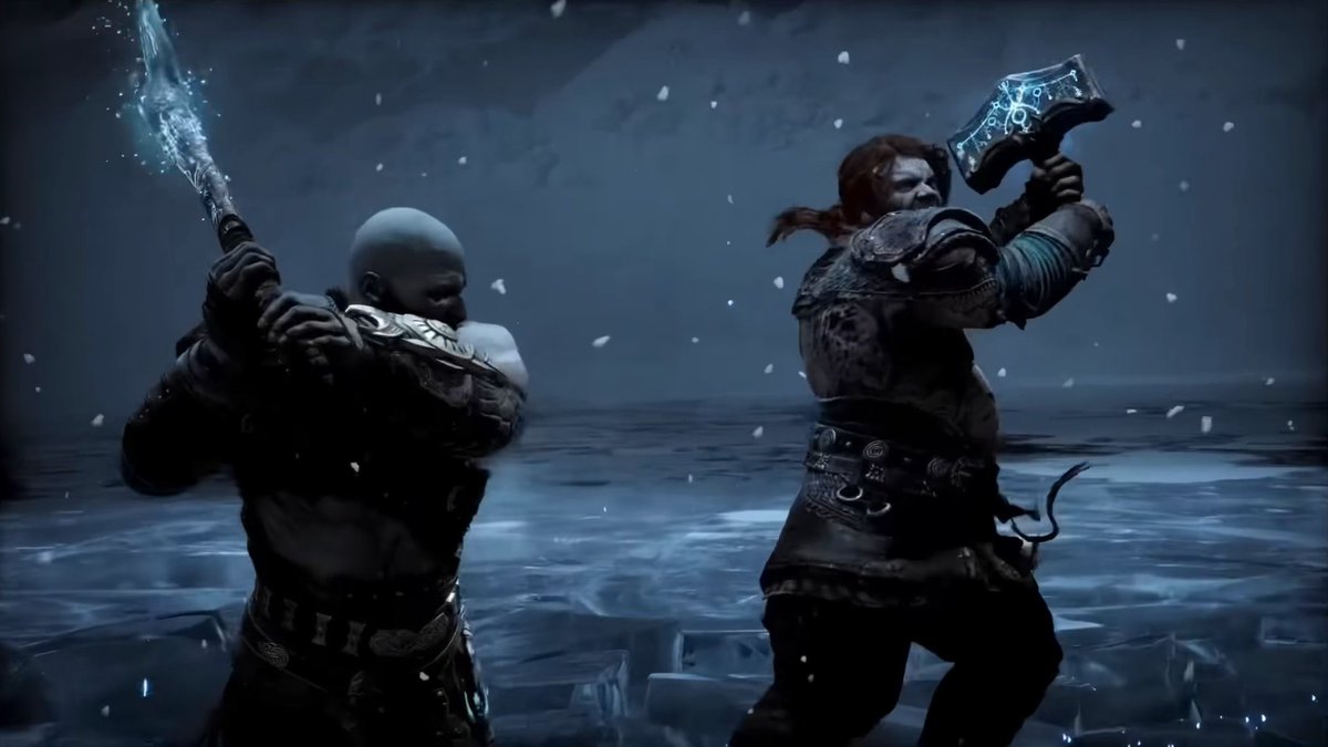 Two warriors, Kratos and Atreus from the God of War video game series, stand in a dark, icy environment wielding their weapons—a glowing blue axe and the Leviathan axe respectively—against a backdrop of falling snow and frozen water.