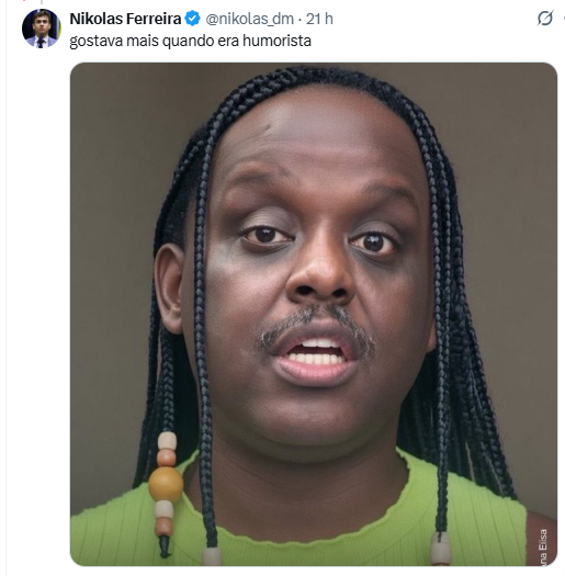A social media post by Nikolas Ferreira (@nikolas_dm) with the Portuguese text 'gostava mais quando era humorista', showing a close-up of a Black man with braided hair and a mustache wearing a green shirt.