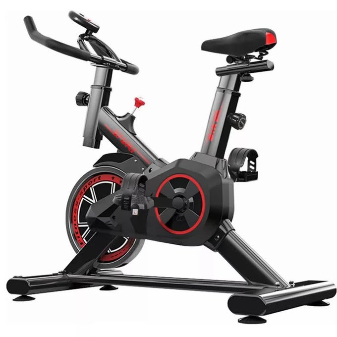 A black and red indoor cycling spin bike is shown on a white background, featuring a heavy flywheel, pedals, and an adjustable seat.