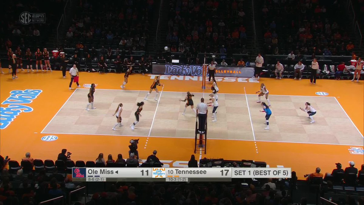 An SEC/ESPN broadcast screenshot of a women's college volleyball match between Ole Miss and #10 Tennessee on an orange court, with the score showing Tennessee leading 17 to 11 in Set 1.
