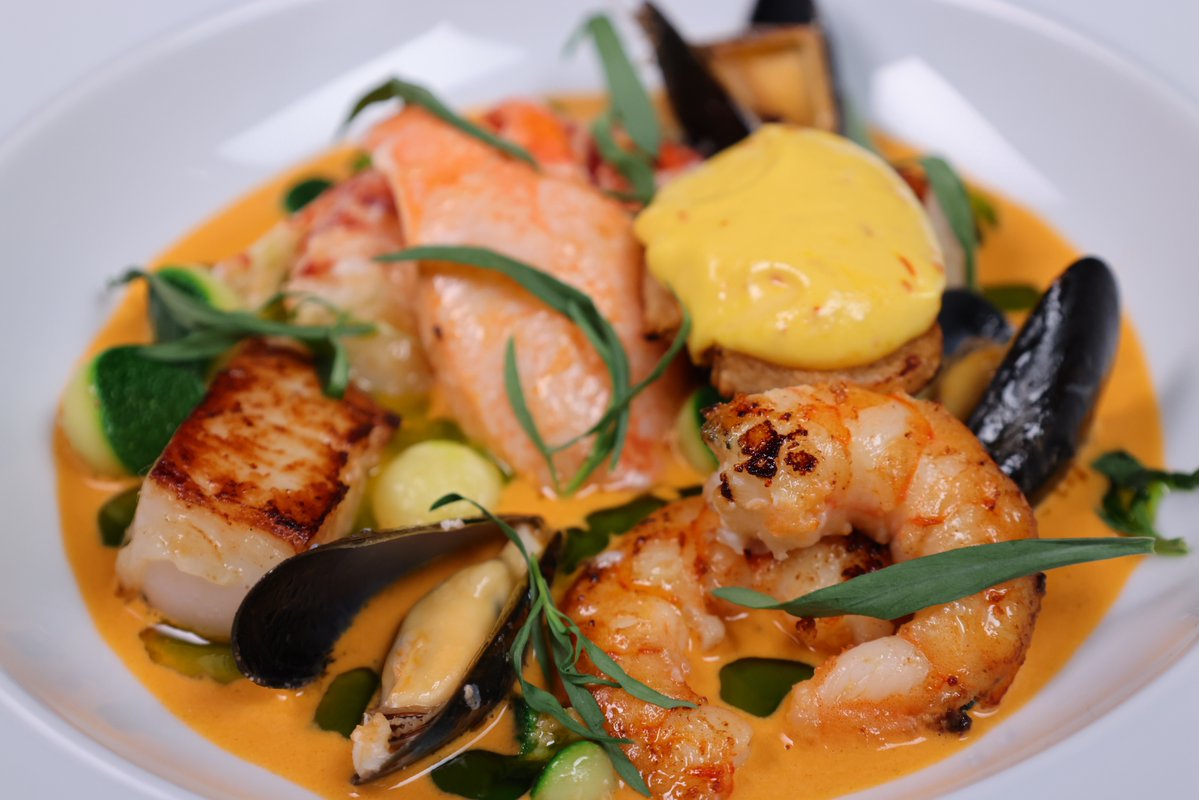 sat_jamesmartin's tweet photo. A rich seafood broth packed with lobster, mussels, prawns and scallops, finished with courgette, tarragon and herb oil. Serve with a crisp baguette topped with homemade saffron rouille 👉 https://t.co/0c3JeK4pj9 https://t.co/xywYbbYrST