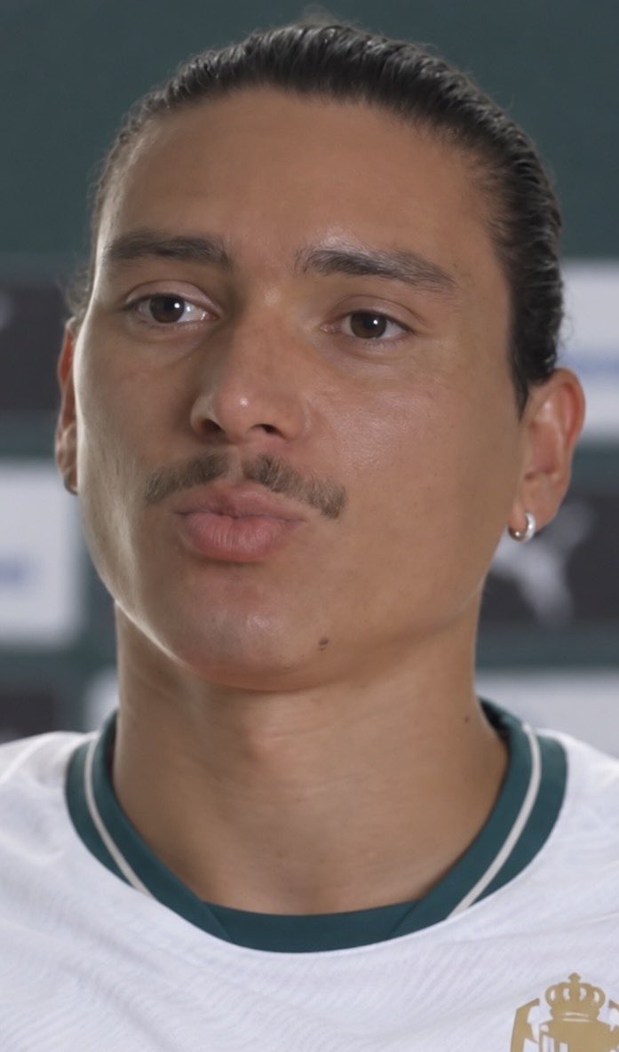 ChinoUTD's tweet photo. 🚨 Darwin Nunez on his conversation with Cristiano Ronaldo:

“Everybody is asking why I covered my mouth when I was speaking to Cristiano.

I did it because I know how football works now. You say three words to somebody, a camera catches it, and by morning people have decided what the conversation was about.

The funny thing is, covering my mouth has made everybody even more curious.

Cristiano was smiling. We were talking about the game, and I told him, ‘You know, there’s something I find strange about you.’

He said, ‘What?’

‘You’re getting close to a thousand goals, and people are still looking for reasons not to be impressed.’

He laughed.

‘Darwin, you think I don’t know?’

I said, ‘No, but I really don’t understand it.’

I’ve been a striker all my life. Believe me, I know how difficult one goal can be. Sometimes you do everything right and the ball hits the post. Sometimes you score and somebody tells you the goalkeeper should have saved it.

Now imagine doing that nearly a thousand times, and people are still arguing about whether you deserve the goals.

I told him, ‘If there was a way to say you scored them illegally, somebody would have found it by now.’

He laughed again.

But I meant it.

People can prefer Messi. I have enormous respect for Messi. He’s one of the greatest players football has ever seen.

What I don’t understand is why some people seem unable to enjoy Messi without finding a reason to be angry at Cristiano.

You can believe Messi is the greatest footballer. That’s your opinion.

But why should Cristiano having more career goals make you angry?

It doesn’t take anything away from Messi.

That’s what I find strange. Sometimes I think people spend so much time trying to reduce Cristiano’s achievements that they forget to appreciate their own favourite player.

And I told Cristiano something else.

‘Your country should be proud of this. Football should be proud of this. We’re talking about the greatest goalscorer the game has seen. People can argue about who plays better football, but they cannot argue those goals out of existence.’

He looked at me and said, ‘I haven’t scored a thousand yet.’

I said, ‘That’s exactly the problem with you. I’m trying to give you a compliment and you’re correcting the statistics.’

He smiled.

People will look at the goal and say it was a tap-in. Fine. But I play as a striker. I know how many times you can make that same movement and the ball never arrives.

Cristiano has made a career out of being where the ball is going to be before everybody else realises it.

That’s not luck you can repeat 980 times.

But something else happened that I found interesting.

Coman was running towards goal with Cristiano beside him. Two attackers against one defender. He could have passed to Cristiano, but he decided to finish it himself.

And Cristiano celebrated with him.

I smiled because I could already imagine what people would have said if Cristiano had complained.

‘He’s selfish. He only cares about his goals.’

But he celebrated, and I doubt those same people will spend much time talking about that.

That’s the strange thing about Cristiano. Sometimes people have already decided what kind of person he is, and they’re only waiting for something that confirms it.

I remember telling him earlier, ‘You know, when you reach a thousand, somebody will probably ask why you didn’t score them sooner.’

He laughed.

But I wasn’t entirely joking.

He’s 20 goals away from something nobody has ever achieved at this level. I think people should enjoy watching that happen, even if he isn’t their favourite player.

Because one day Cristiano will stop scoring, and everybody will suddenly remember how extraordinary it was.

Before we separated, I asked him, ‘Cristiano, when you reach a thousand, will you finally be satisfied?’

He looked at me like I’d asked him to retire.

I think that was my answer.”