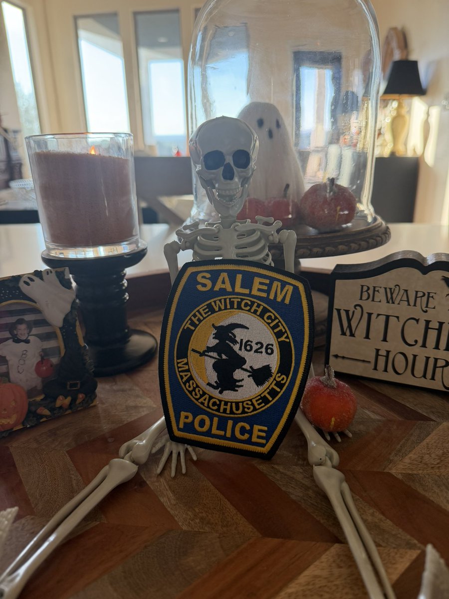 MaureenEnnor's tweet photo. Thank you, Salem Massachusetts Police Department, for the patch. It is already in my Halloween collection, and it is staying there.
The skeleton is on duty with it tonight. Witch City, 1626, and a broomstick on the shield — this one fits the season and the shelf. Grateful for the department and for every officer who wears the badge, especially this time of year when the decorations come out and the real work does not stop.
#SalemMA #SalemPD #ThinBlueLine #Halloween #PoliceWife #BackTheBlue