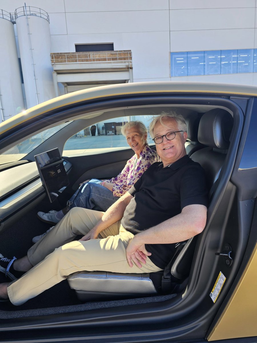 mayemusk's tweet photo. Today, @arthurwallen2 and I were driven by the CyberCab at the @Tesla Gigafactory Texas. Besides being driverless, Art was also impressed by the huge trunk. 

Two highly knowledgeable and enthusiastic engineers gave us a marvelous tour of the factory, witnessing the innovation and technology that Tesla is utilizing in this state of the art location.

Thank you, @elonmusk
