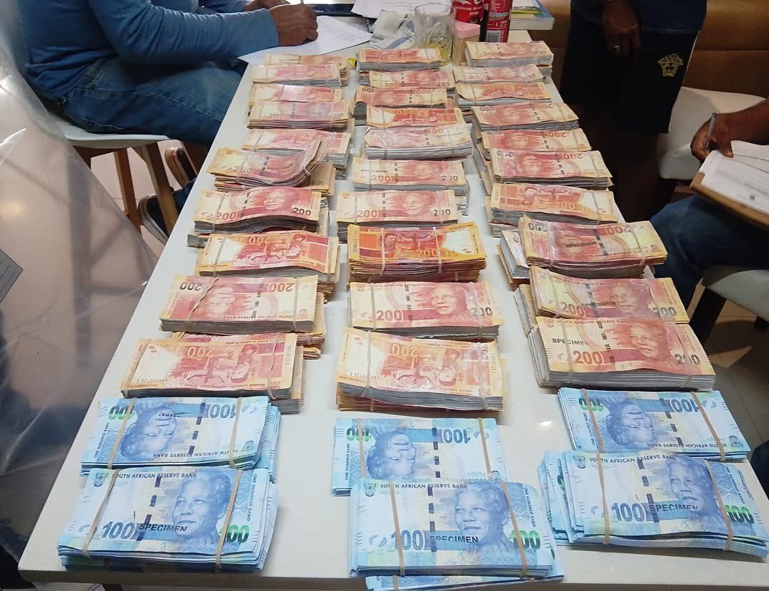 Abramjee's tweet photo. DURBAN METRO POLICE SEIZE R1.6 MILLION IN COUNTERFEIT CASH

Durban Metro Police have arrested a Ugandan national after seizing counterfeit cash estimated at R1.6 million during a raid at an upmarket flat in Umhlanga Ridge on Friday, 9 October 2026.

The operation involved the Tactical Support Unit, Hawks and Counter Narcotics KZN following intelligence about suspicious activity. 

The flat was allegedly being used as a brothel, while the suspect was also allegedly linked to a “Black Dollar” counterfeit money scheme.

Police seized the counterfeit cash, an iPhone 16, a safe and two passports with expired visas. 

Fingerprint and DNA evidence was collected from safes at the scene.

The suspect faces charges including counterfeiting, contravention of the South African Reserve Bank Act, keeping a brothel and illegal immigration. 

He is expected to appear in the Durban Magistrates’ Court on Monday, 12 October.