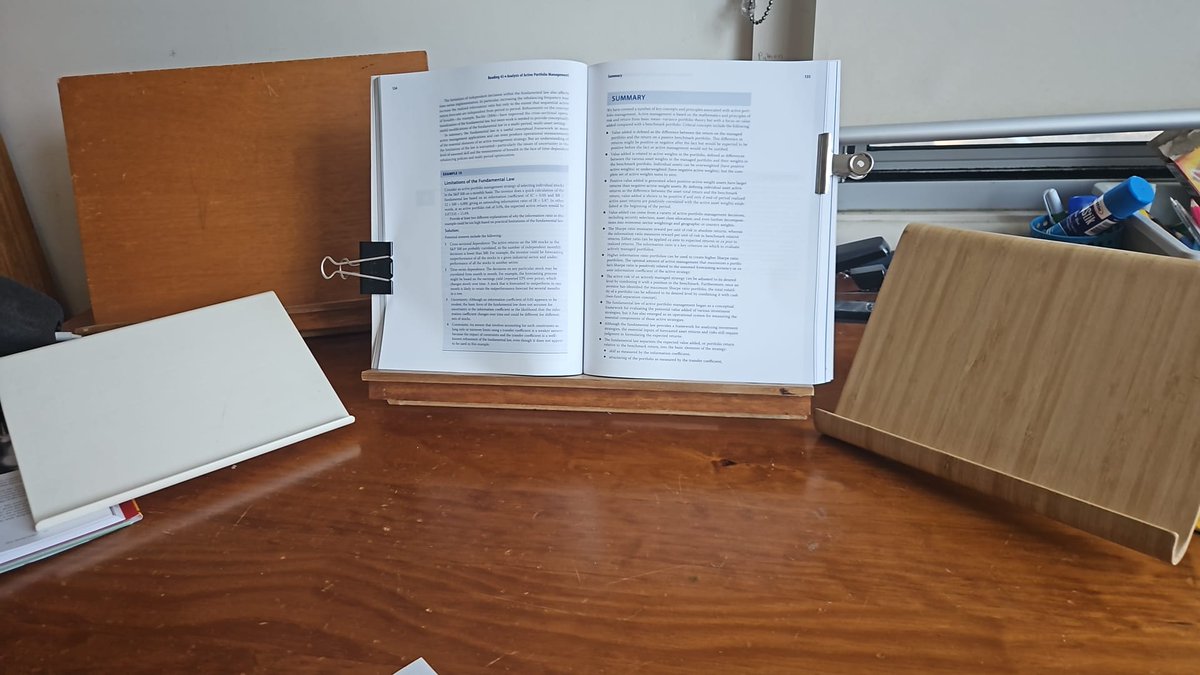 toy59496's tweet photo. How to Read Forever

Many of you know that I read... I read A LOT. 

About 5 years ago I spent about 12 hours a day reading each day five days a week so that I understood a bit more about finance. I used the CFA curriculum as a framework but then read broadly around every other subject as the curriculum has significant limitations, eg it doesn't even mention the Kelly Criterion, and does not explore the mathematical underpinnings of quite a bit of the portfolio theory.

You can see one of my many bookshelves, and probably not the most interesting one. 

But it's fatiguing holding books for so long so I thought I would show you my setup both for the iPad and for Kindle/Kobo, as well as for the desk.

I use a stand that is only $60 from Amazon and an electronic page turner which is about $30. With the Kobo you can get a Bluetooth one that works well. 

For the actual heavier books I use a series of book stands and giant clips so that I can concentrate on the content and not the physicality of holding the book open. It also helps orient the book vertically which is a lot better on neck mechanics. 

I tend to write notes in the books themselves. 

Show me your setup....