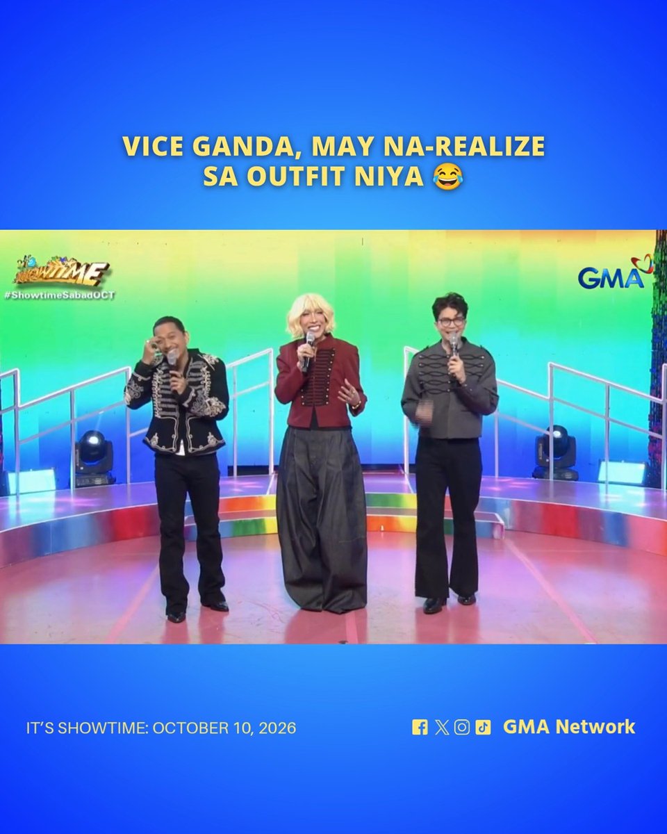 A screenshot from a Filipino variety show with text 'VICE GANDA, MAY NA-REALIZE SA OUTFIT NIYA', showing Vice Ganda in a blonde wig between two male co-hosts on a colorful stage, dated 'OCTOBER 10, 2026' for 'GMA Network'.