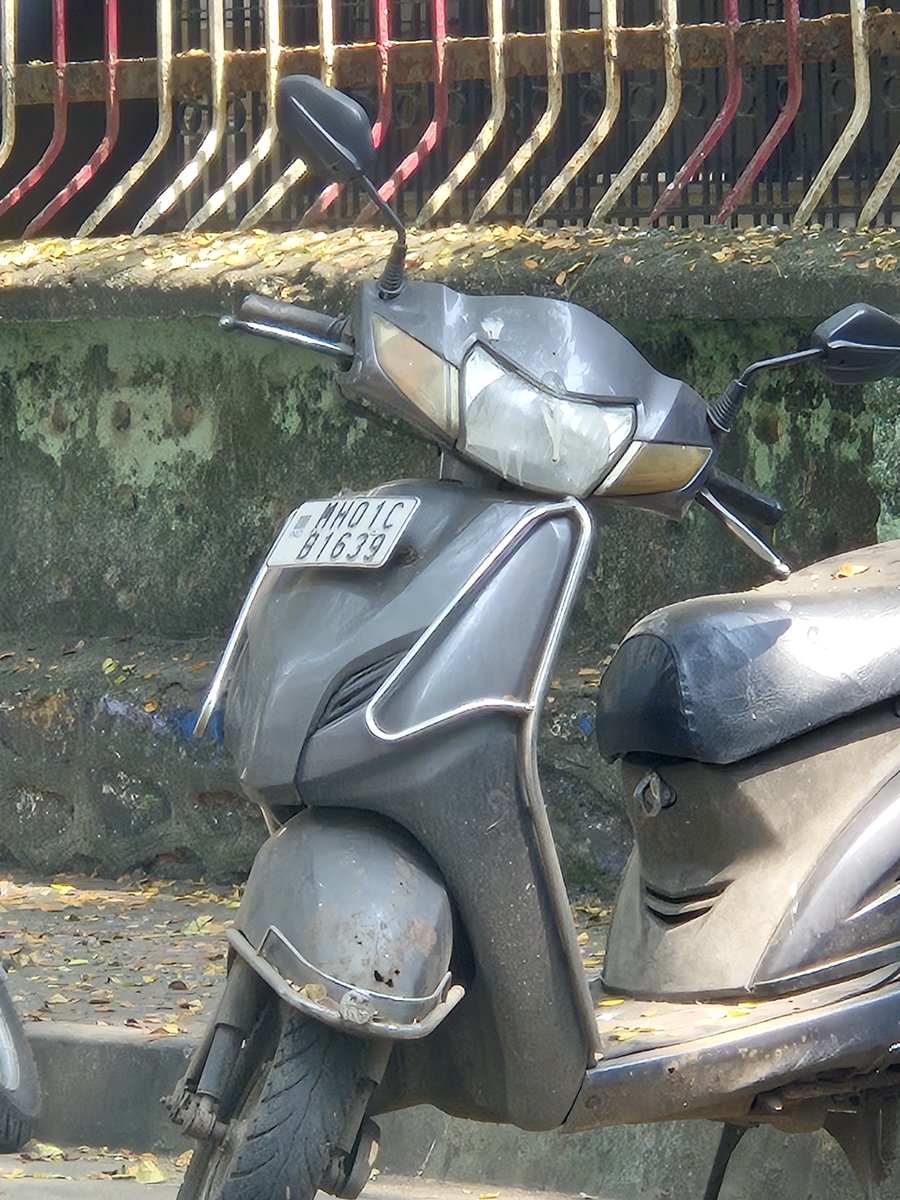 Beinghuman7715's tweet photo. @MTPHereToHelp @CPMumbaiPolice @AddCPCentralMum @MumbaiPolice unknown abandoned scooter, with holes in its body &amp; not moved for months. Does not belong to local residents of societies. Outside bldg14 Sainik Sadan Rd Adarsh Ngr Century Bazar Prabhadevi. Pls move it out. https://t.co/vYdZwre3zD
