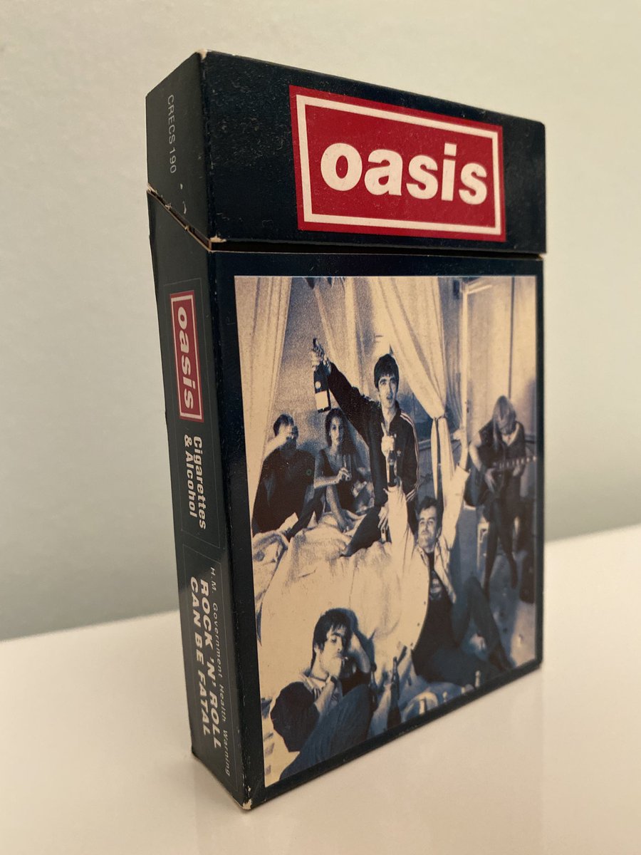 scyhodotcom's tweet photo. On October 10th 1994, Oasis released the 'Cigarettes &amp; Alcohol' single.

The cassette single designed by @MicrodotCreativ is a work of art. https://t.co/YkyBD3Lk1h