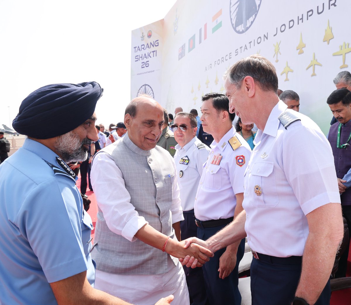 rajnathsingh's tweet photo. Witnessed the second edition of ‘Exercise Tarang Shakti’ in Jodhpur today. 

There is considerable scope for cooperation in research, co-development, co-production, maintenance, training, and innovation. The defence relationships of the future will be about technology and trust, not just about platforms. India is ready to explore these possibilities with countries that share our commitment to a stable, secure, and peaceful international environment.

We are aware that no nation can afford to operate in isolation. Critical technologies, resilient supply chains, operational inter-operability and trusted partnerships are becoming increasingly important elements of national power. 

For India, therefore, building strong indigenous capabilities must go hand in hand with meaningful cooperation with trusted partners. We must be capable of acting independently when required, while also being able to operate effectively with others when our interests and responsibilities converge.

It is precisely in this context that an exercise like Tarang Shakti assumes special significance. It translates the broader ideas of capability, technology, interoperability and trust into operational experience. By bringing together air forces, with diverse platforms and philosophies, it enables aircrews and commanders to sense, decide, and act together across different languages of command.

The canvas of Tarang Shakti extends well beyond flying operations. Industrial tours expose participating contingents to India’s expanding aerospace, defence manufacturing and technological ecosystem, while professional engagements promote the exchange of knowledge and experience.