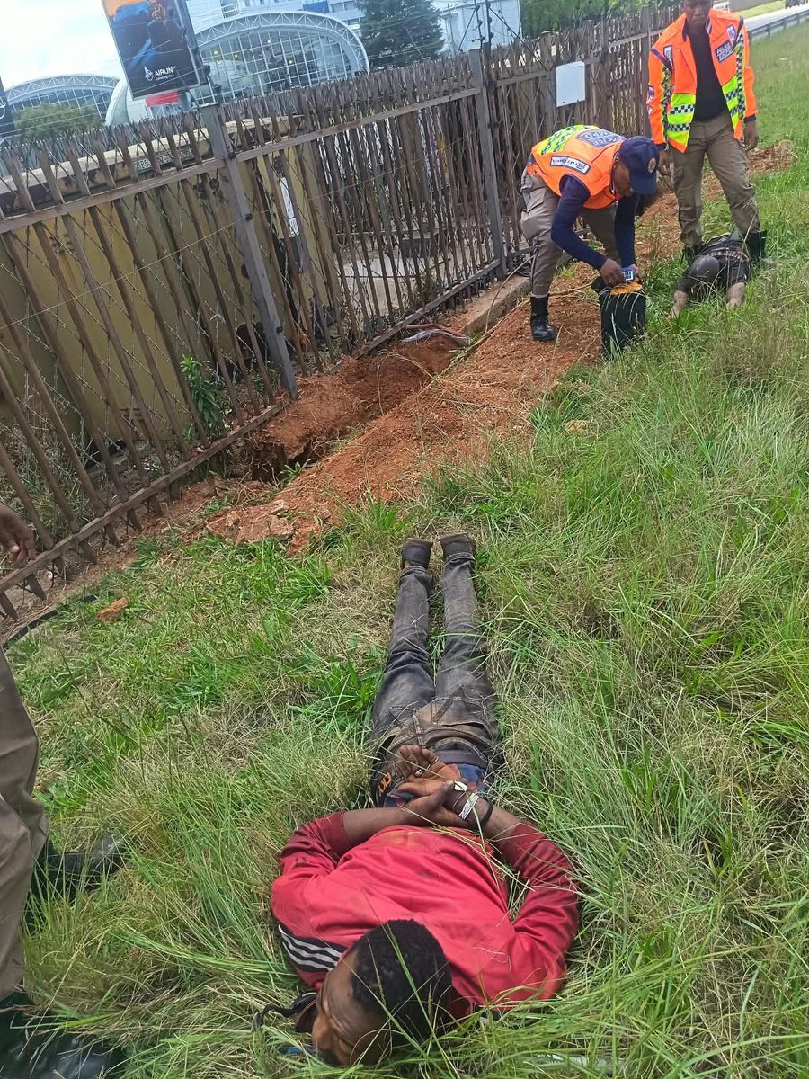 Abramjee's tweet photo. TWO CAUGHT RED HANDED BY THE R21 FREEWAY IN KEMPTON PARK AREA 
 
On Wednesday 07 October 2026 at approximately 10:00 the Metropolitan Police Department (EMPD) Officers deployed at the O R Tambo international Airport (ORTIA), weremonitoring an electrical sub-station, situated on the R21 freeway, which had been experiencing cable theft.
 
The first complaint was received in September this year where one (01) suspect was arrested, for tampering with essential infrastructure, theft of cable and possession of stolen cables, by the EMPD ORTIA members. Following that complaint, members of this unit, together with the Airport Company South Africa (ACSA) Security personnel, began monitoring the sub-station using the advanced CCTV camera system.
 
While monitoring the said sub-station, two (2) African males in their 30's, were spotted crossing the freeway and going to the sub-station. 

The suspicious pair scouted the area before they started to dig up the electrical cable, which was in the trench. 

EMPD Officers, were mobilized and a tactical takedown was executed. 

Both suspects were caught red-handed, before they were handcuffed and taken to the Kempton Park police station where a case docket was opened against them. 

They are expected to appear at the relevant Magistrate's Court.