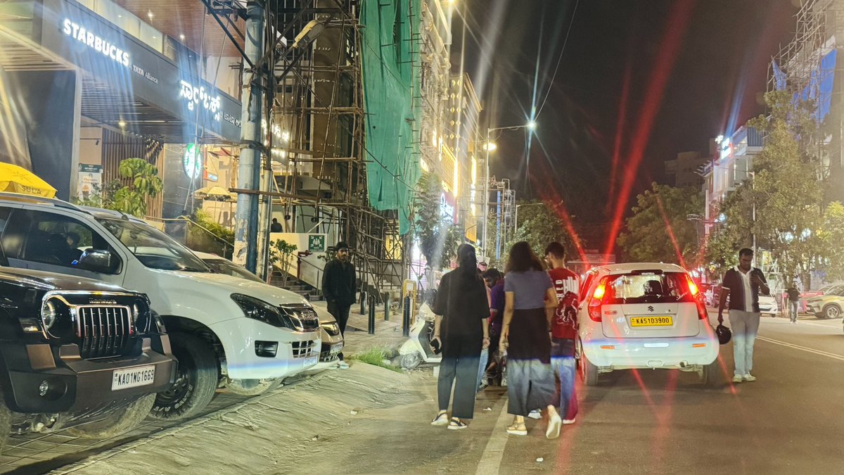 RTI_KARNATAKA's tweet photo. Complaint against Hangover Pub, HSR Layout, Bengaluru

@BlrCityPolice @Jointcptraffic @krishnabgowda @PriyankKharge 

Cars are being parked on the public footpath in front of Hangover Pub, forcing pedestrians to walk on the busy road and putting their safety at risk.

Despite repeated complaints and photo evidence being available to support immediate action, @hsrltrafficps Inspector Mr. Manjunath has allegedly ignored the complaint. He reportedly stated that the pub belongs to the Karkala MLA and that he cannot take action.

Is the law above political influence, or does it apply differently to establishments linked to politicians?

I urge the Joint Commissioner of Traffic and GBA authorities to investigate this matter, verify the evidence, and take immediate action against illegal footpath parking and obstruction.

Who will protect the rights and safety of ordinary pedestrians? Public footpaths must be kept free from illegal parking, irrespective of political connections.

#HSRLayout #BengaluruTraffic #FootpathEncroachment #IllegalParking #GBA #Accountability