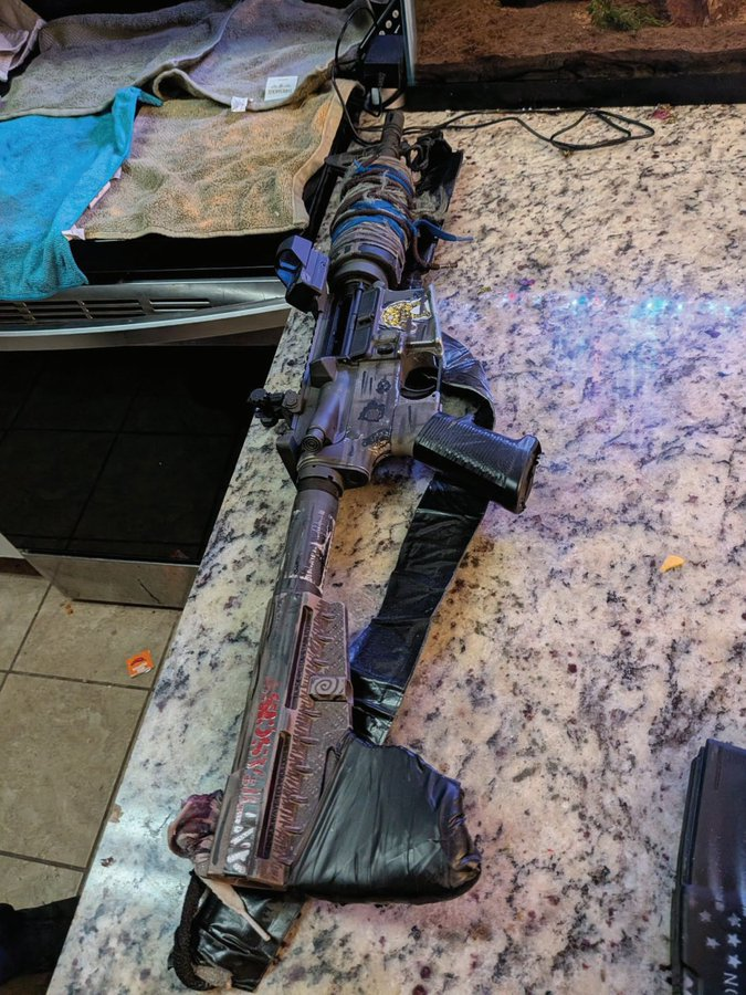 MrAndyNgo's tweet photo. MORE TRANTIFA TERROR: Members of an Antifa terror cell in Huntsville, Ala. have been federally charged for allegedly making threats to kill ICE federal agents and possessing illegal firearms.

When one of the trans militants was detained by police last month, he was found with a cache of weapons, drugs and ammunition.

Levi "Cici" Belcher, a trans militant from Tennessee, and Anthony Elijah Slota (mugshot below), a trans s—x worker and armed militant, were wearing tactical gear and military-style equipment when they were detained. A search of the car produced a cache of weapons, Antifa propaganda, ammunition and 3D-printed pistols. 

A search of the home they shared with another cell member, Tadashi Ryan Erekson (bearded man pictured below), resulted in authorities finding even more 3D-printed weapon components, Antifa propaganda and illegal guns.

Erekson was arrested after allegedly reaching for a concealed pistol on his ankle during the search of the Antifa base.

The cell was involved in Antifa "mutual aid" and the members posted Antifa propaganda online and photos and videos of their weapons. They were also involved in the Food Not Bombs Huntsville Antifa group.

What authorities discovered here mirrors how Antifa cells organize across the U.S.   Earlier this year, a Texas Antifa terror cell was convicted and sentenced to hundreds of years in prison collectively after carrying out an anti-ICE shooting last year in Alvarado, Texas. At least four members of that cell are trans. https://t.co/8R70C5UC1N 

Excellent reporting by @Hudson_Crozier
https://t.co/iG0Q2cc0kL https://t.co/90Q4lc29An