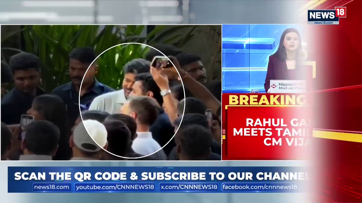 A News18 broadcast shows a crowded scene with one man circled in white, while the breaking news ticker announces "Rahul Gandhi Meets Tamil Nadu CM Vijay," matching the post about Rahul Gandhi congratulating the CM on his victory.